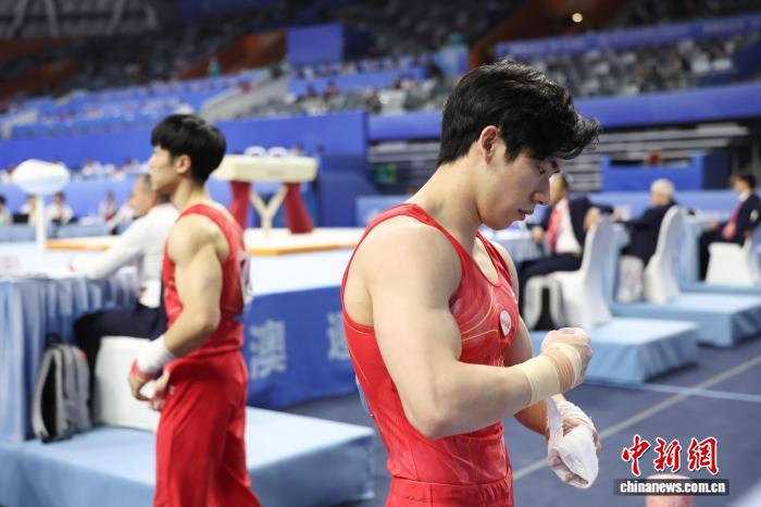 粤港澳全运会现场：身后的雨淋不湿眼前的路，